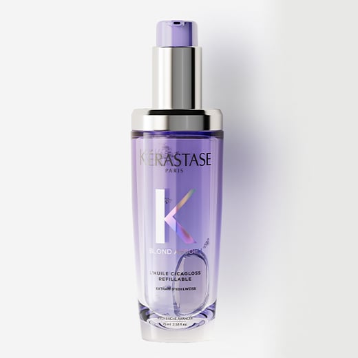  Huile Cicaextreme hair oil is displayed on a pure grey background with transparent cubes. The oil provides strength and shine to bleached and blonde hair.
